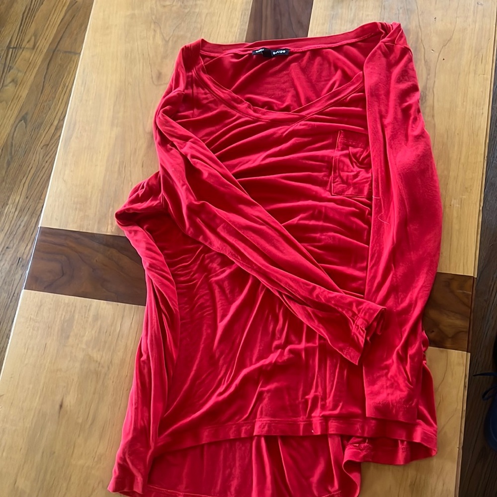 Red long sleeve pocket shirt.